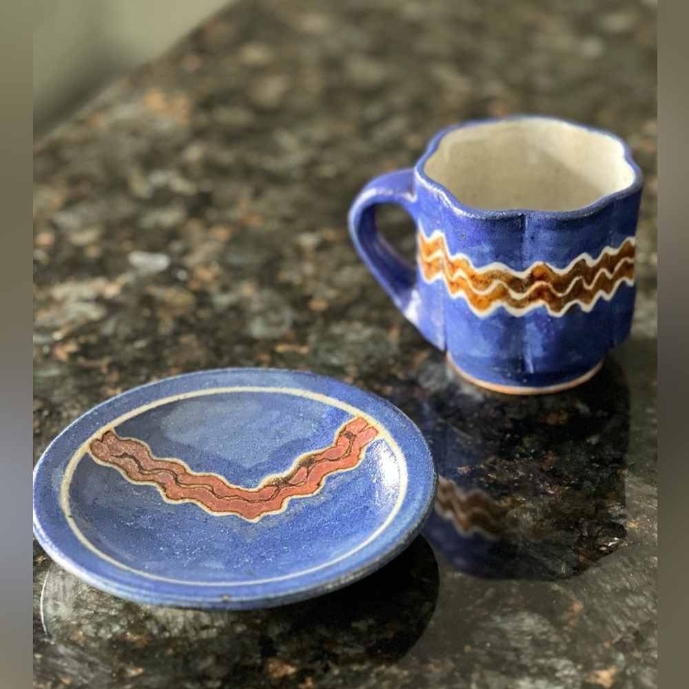 Handmade blue and brown ceramic cup and saucer set